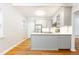 Bright kitchen featuring stainless steel appliances, white cabinets, and quartz countertops at 430 Lindbergh Ne Dr # M1, Atlanta, GA 30305