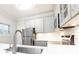 Updated kitchen featuring stainless steel appliances and ample counter space at 430 Lindbergh Ne Dr # M1, Atlanta, GA 30305
