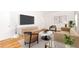 Living room featuring stylish furniture, a large TV, and ample natural light at 430 Lindbergh Ne Dr # M1, Atlanta, GA 30305