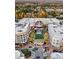 Aerial view showcases the Avalon community with shops, restaurants, and green spaces at 110 Chiswick Cir # 40, Alpharetta, GA 30009