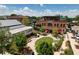 Aerial view of Avalon community space with lawn, gardens and outdoor seating areas at 110 Chiswick Cir # 40, Alpharetta, GA 30009