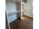 This closet space has hardwood floors, built-in shelving and a window for natural light at 110 Chiswick Cir # 40, Alpharetta, GA 30009