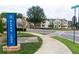 Street view of Alpha Loop community showcasing sidewalks and crosswalks at 110 Chiswick Cir # 40, Alpharetta, GA 30009