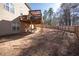 Backyard view of deck, door, and privacy fence at 849 Kirsten Jane Ct, Lawrenceville, GA 30045