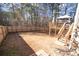 Fenced backyard with wooden deck and stairs at 849 Kirsten Jane Ct, Lawrenceville, GA 30045