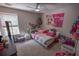 The bedroom is uniquely decorated and is filled with toys and colorful decor at 849 Kirsten Jane Ct, Lawrenceville, GA 30045