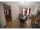 Cozy dining room with tile floors and elegant wainscoting, great for hosting Gathering gatherings at 849 Kirsten Jane Ct, Lawrenceville, GA 30045