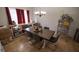 Inviting dining room with ample seating, a chandelier, and stylish decor, perfect for Gathering meals and gatherings at 849 Kirsten Jane Ct, Lawrenceville, GA 30045