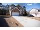 Attractive brick home with a two-car garage and a long driveway at 849 Kirsten Jane Ct, Lawrenceville, GA 30045