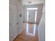 Bright foyer featuring hardwood floors and a staircase at 849 Kirsten Jane Ct, Lawrenceville, GA 30045