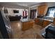 Open kitchen with stainless steel appliances and view to the living room, perfect for modern living at 849 Kirsten Jane Ct, Lawrenceville, GA 30045