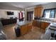 Open-concept kitchen featuring an island with a seamless transition to the living room and stainless appliances at 849 Kirsten Jane Ct, Lawrenceville, GA 30045