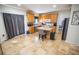 Bright eat-in kitchen featuring tile flooring, stainless steel appliances, ample counter space, and abundant natural light at 849 Kirsten Jane Ct, Lawrenceville, GA 30045