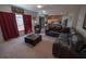 Comfortable living room with tile flooring in the corner of the room and ample natural light at 849 Kirsten Jane Ct, Lawrenceville, GA 30045