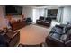 This living room has carpet floors, furniture, curtains, and a television at 849 Kirsten Jane Ct, Lawrenceville, GA 30045