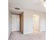 A bedroom with carpet and two closets at 310 Comeragh Se, Smyrna, GA 30080