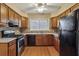 Kitchen with wooden cabinets and stainless steel appliances at 310 Comeragh Se, Smyrna, GA 30080