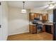 Cozy kitchen with wooden cabinets and stainless steel appliances at 310 Comeragh Se, Smyrna, GA 30080