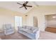 A comfy living room showing a vaulted ceiling, beams, and ample space at 310 Comeragh Se, Smyrna, GA 30080