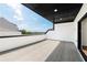 Modern balcony featuring flat roof and decorative panels at 3474 Dryden Se Ln, Vinings, GA 30339