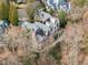 An aerial view of a stately residence, highlighting its detailed architecture and well-maintained landscape at 675 W Paces Ferry Nw Rd, Atlanta, GA 30327