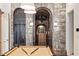 Billiard room with stone archways and a well-crafted billiard table at 675 W Paces Ferry Nw Rd, Atlanta, GA 30327