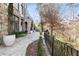 Flagstone path along the side of the house showcases the estate's architecture and landscaping at 675 W Paces Ferry Nw Rd, Atlanta, GA 30327