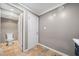 Practical half bathroom with neutral color palette, white toilet and tile-look flooring at 1300 Indian Nw Trl, Atlanta, GA 30327