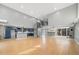 Spacious living room featuring hardwood floors, spiral staircase, recessed lighting and adjoining kitchen at 1300 Indian Nw Trl, Atlanta, GA 30327