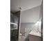 Bathroom featuring a vanity and shower at 180 S Alexander St, Buford, GA 30518