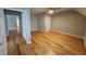 Bedroom featuring hardwood floors, gray walls, and a ceiling fan at 180 S Alexander St, Buford, GA 30518