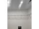A closet with wire shelving and a dropped door at 180 S Alexander St, Buford, GA 30518