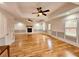 Open-concept living room showcasing hardwood floors, fireplace, and recessed lighting at 180 S Alexander St, Buford, GA 30518