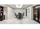 Spacious conference room with modern furniture, marble floors, and ample lighting at 2870 Pharr Court S Nw # 2006, Atlanta, GA 30305