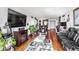 Spacious living room featuring hardwood floors, stylish decor, and a comfortable seating area at 2870 Pharr Court S Nw # 2006, Atlanta, GA 30305