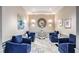 Elegant lobby featuring stylish blue chairs, marble floors, and decorative accents at 2870 Pharr Court S Nw # 2006, Atlanta, GA 30305