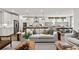 Open-concept living room with kitchen, and comfortable seating at 313 Canoe Pl, Villa Rica, GA 30180