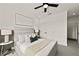 Cozy main bedroom featuring a comfortable bed, soft lighting, and contemporary design at 313 Canoe Pl, Villa Rica, GA 30180