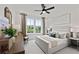 Serene main bedroom retreat with natural light, plush bedding, and elegant decor at 313 Canoe Pl, Villa Rica, GA 30180