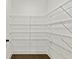 Walk-in closet with white walls and wire shelving for optimal storage and organization at 313 Canoe Pl, Villa Rica, GA 30180
