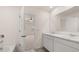 Bathroom with a double sink vanity and open view of the main bedroom at 195 Amberjack Trl, Covington, GA 30016