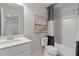 Bathroom featuring a shower-tub combo, and a sink vanity at 308 Navigator Ln, Mcdonough, GA 30253