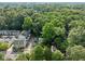 Lush aerial view of a neighborhood featuring tree-lined streets and well-maintained residences at 428 Sycamore Dr, Decatur, GA 30030