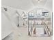 View of attic space from the stairs, featuring hardwood floors, piano and natural light at 428 Sycamore Dr, Decatur, GA 30030