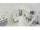 Bright attic space with white walls, a modern desk and lounger at 428 Sycamore Dr, Decatur, GA 30030