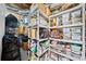 Basement storage area with organized shelving and boxes full of supplies at 428 Sycamore Dr, Decatur, GA 30030