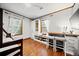 Bedroom with hardwood floors, a storage unit and a built-in desk at 428 Sycamore Dr, Decatur, GA 30030