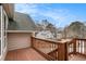 Wood back deck overlooking the neighborhood, showing wood handrails, stairs, and siding at 4962 Preswick Ne Ct, Marietta, GA 30066