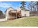 The backyard of this house features a wooden deck with stairs, providing an ideal space for outdoor activities at 4962 Preswick Ne Ct, Marietta, GA 30066