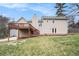 A charming two-story home featuring a spacious two-level wooden deck, perfect for outdoor relaxation and entertainment at 4962 Preswick Ne Ct, Marietta, GA 30066